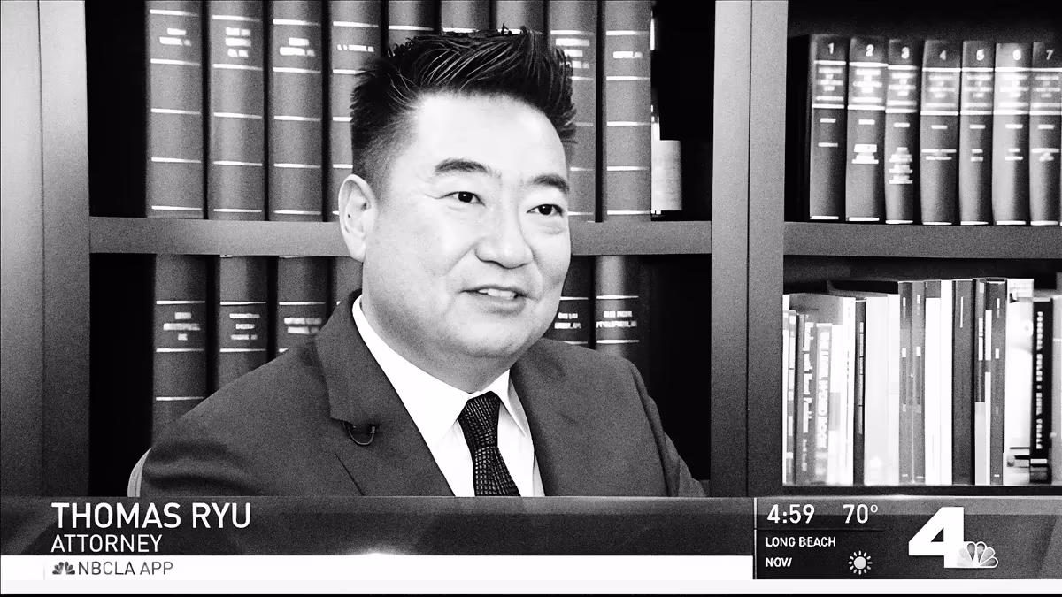 Attorney Thomas J. Ryu discusses the Lin Trials during an NBC Los Angeles interview in his office.